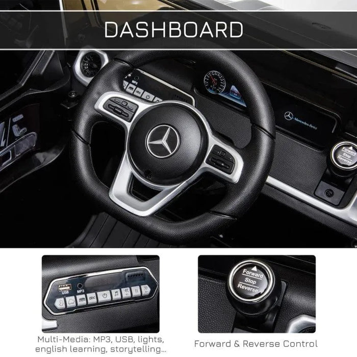 Mercedes-Benz G500 kids ride-on jeep dashboard with steering wheel, controls, MP3 USB panel, and forward-reverse button
