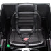 Black plastic seat with safety harness in a kids' Mercedes-Benz G500 ride-on jeep