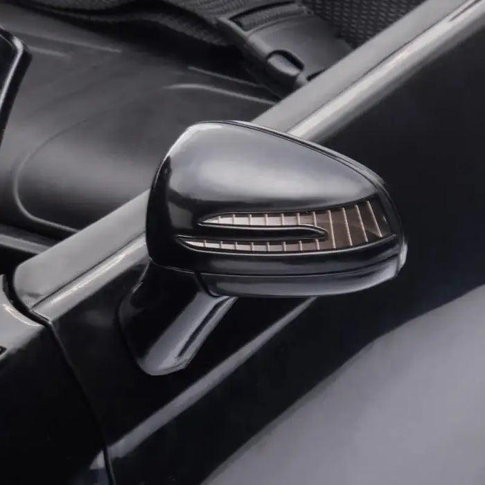 Close-up of black side mirror on 12V Mercedes-Benz SLC 300 kids electric ride-on car