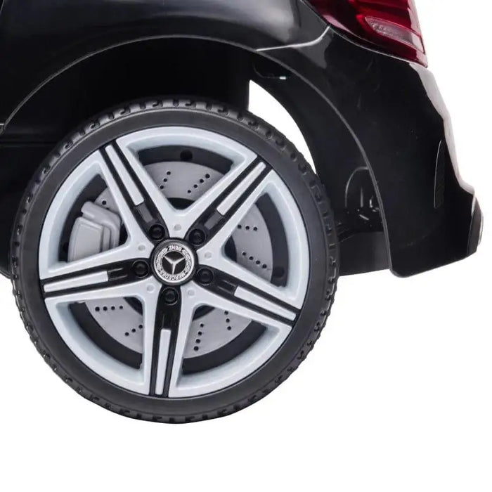 Close-up of rear wheel on black Mercedes-Benz SLC 300 kids electric ride-on car