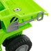 Green kids electric ride-on dump truck with attached gray toy shovel and large black tire
