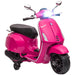 Pink Vespa scooter toy with black seat, working headlight, and training wheels on white background