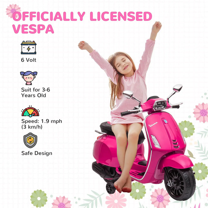 Happy child sitting on pink officially licensed Vespa electric ride-on scooter for kids