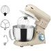 Beige stand mixer with metal bowl and attachments on a white background