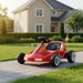 Red toy go-kart with racing decals in a front garden setting