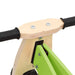 Green and black adjustable balance bike handlebar and frame close-up