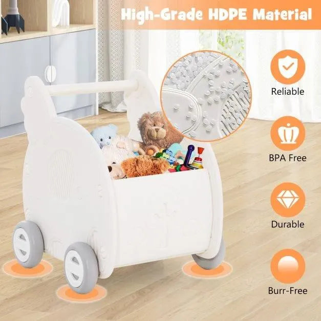 White elephant-shaped baby walker and push toy with shopping cart design, filled with toys, on a wooden floor.