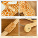 Close-up of yellow giraffe plush rocking horse features: soft padding, wooden wheels, handle, pedal.
