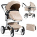 Beige baby stroller with accessories on a white background