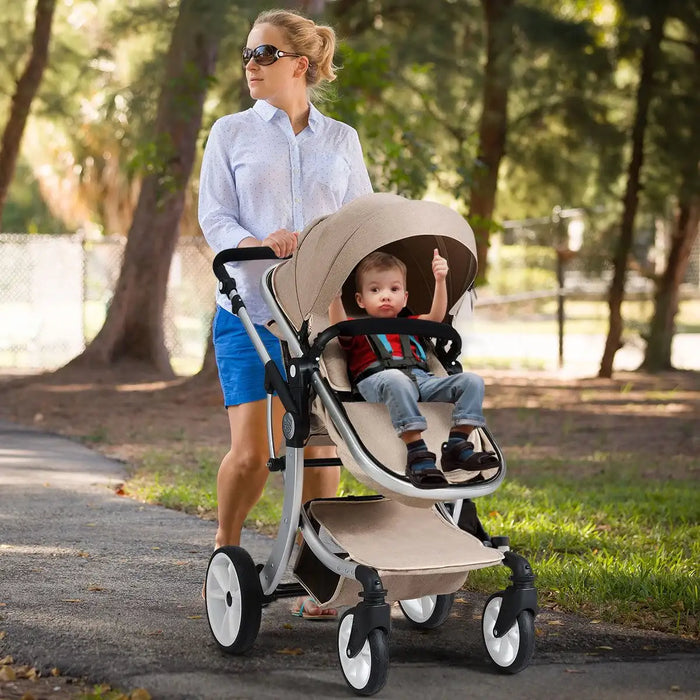 Woman pushing a stroller with a child in a park