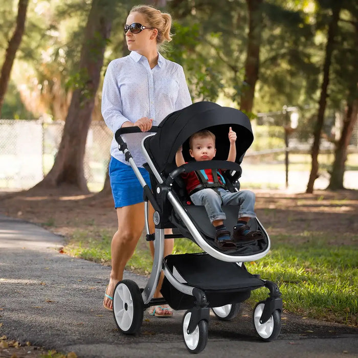 Woman pushing a stroller with a child in a park