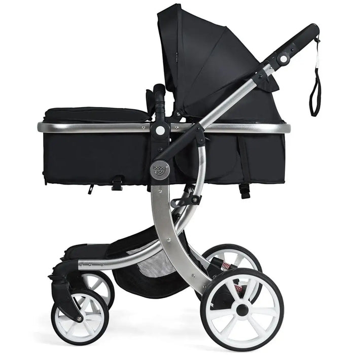 Black and silver stroller on a white background