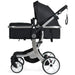 Black and silver stroller on a white background