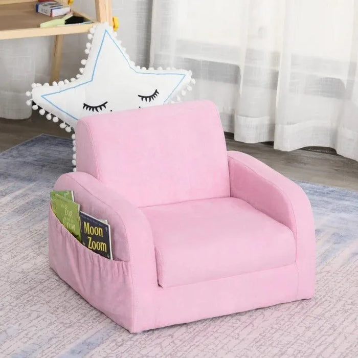Pink 2-in-1 kids chair with side book pocket in cozy playroom setting