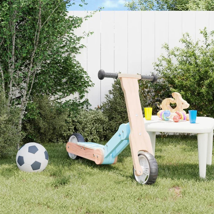 2-in-1 light blue kids scooter and balance bike by table with toys and soccer ball outdoors