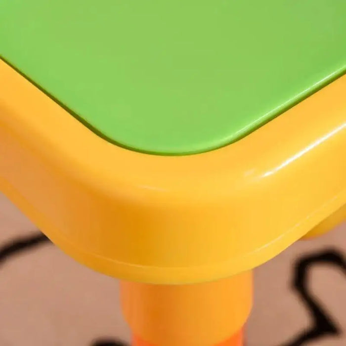 Close-up of yellow and green plastic sensory play table corner