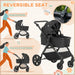 Black stroller with reversible seat feature, shown in viewing and parent-child modes.