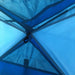 Interior roof view of blue and grey 2-person dome tent with mesh panels and hook