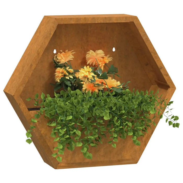 Hexagonal corten steel wall planter with orange flowers and trailing green foliage
