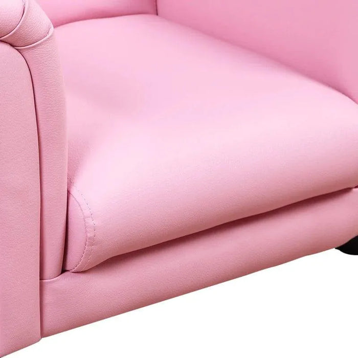 Close-up of a pink kids armchair with soft padded upholstery