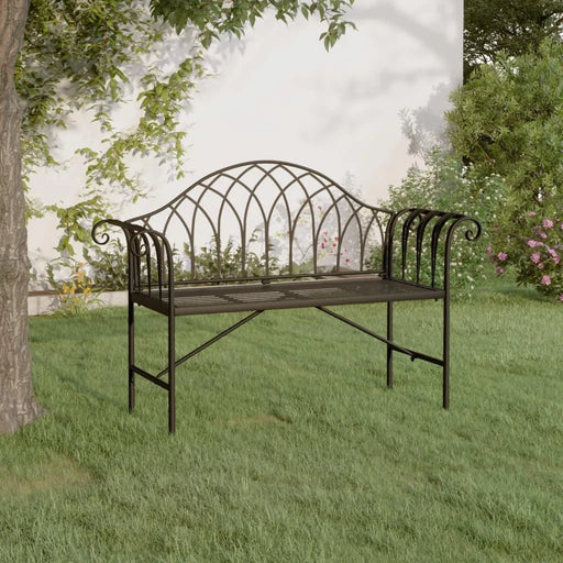 Black metal 2-seater garden bench with armrests on a lawn, outdoor setting with trees