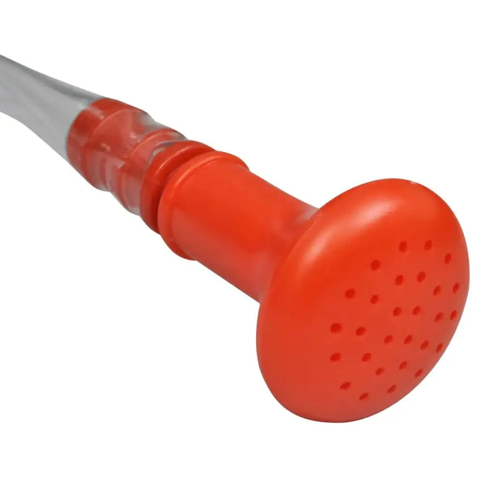 Close-up of red shower head and hose for solar camp shower bag