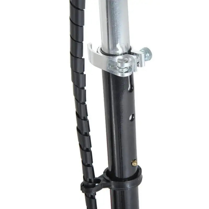 Close-up of adjustable seat post and locking clamp on black foldable electric scooter