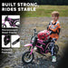 Child in motocross outfit sits on pink 24V kids electric dirt bike outdoors, helmet on seat.