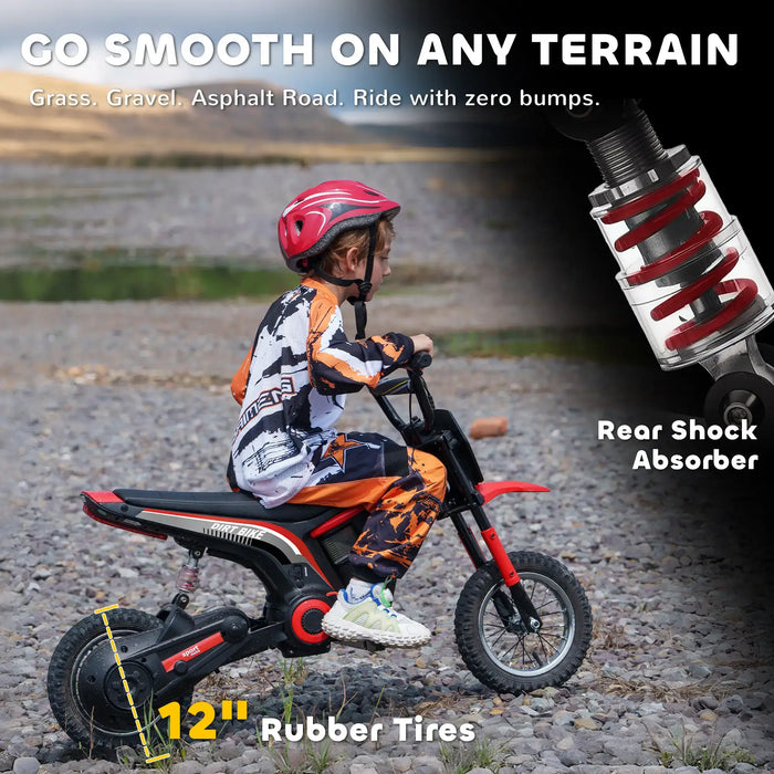 Child riding red 24V kids electric dirt bike with 12-inch rubber tires on rocky terrain