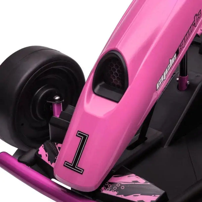 Close-up of a pink kids' electric drift go-kart front with number 1 and rear wheel