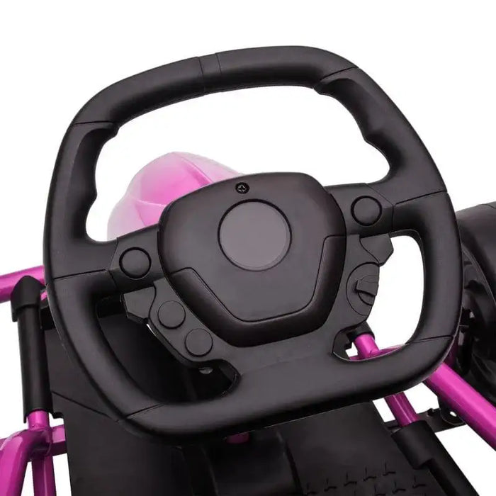 Close-up of black steering wheel on pink kids electric drift go-kart