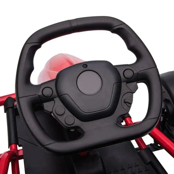 Close-up of black steering wheel on red kids electric drift go kart