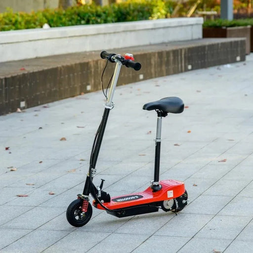 Red 24V kids ride on powered scooter with seat, handbrake, and bell on paved outdoor path