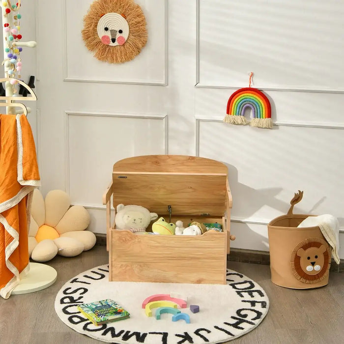 Children's room with wooden toy chest, colorful toys, and decorative items.