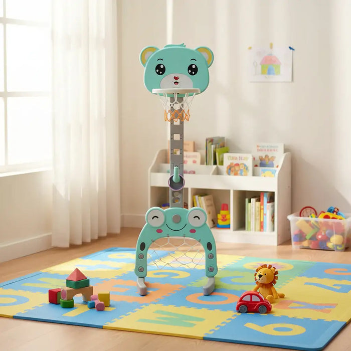Children's basketball hoop with teddy bear design on a colorful mat in a room with toys and books.