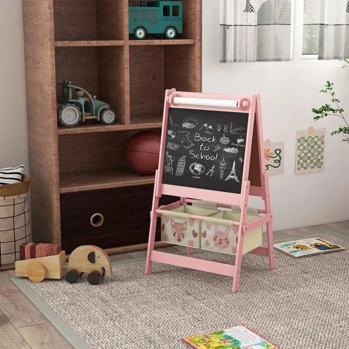 Pink 3-in-1 kids easel with blackboard, animal storage bins, and toys in a cozy playroom