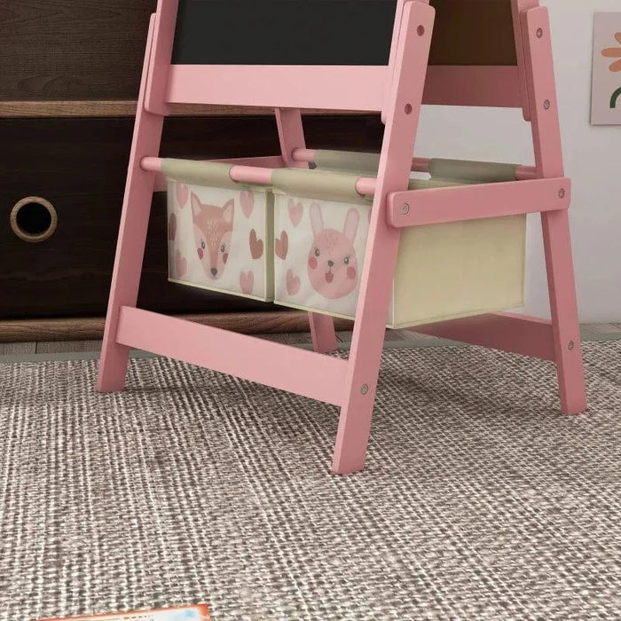 Pink kids' 3-in-1 easel with animal-themed storage baskets in a playroom