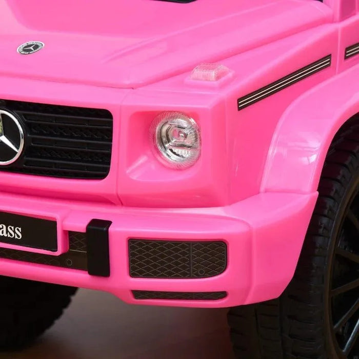 Close-up of pink kids Mercedes-Benz G350 sliding ride-on toy car front detail