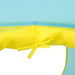 Close-up of yellow tie and blue fabric on kids play tent tunnel entrance.