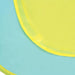 Close-up of yellow fabric edge on blue surface, kids play tent material detail.