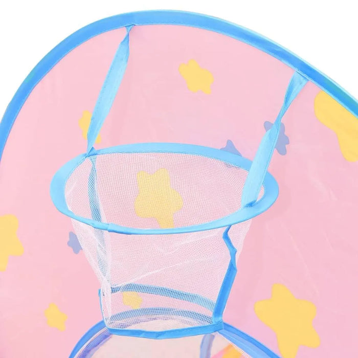 Pink princess castle play tent with yellow star designs and blue mesh basket