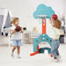 Two toddlers playing indoor with colorful kids basketball hoop in a bright nursery room