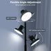 Black floor lamp with adjustable head on a gray background