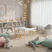 3-piece kids table and chair set with storage, white and chalkboard tabletop in playroom