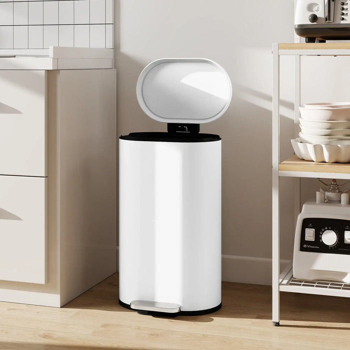 White trash bin with a lid in a kitchen setting