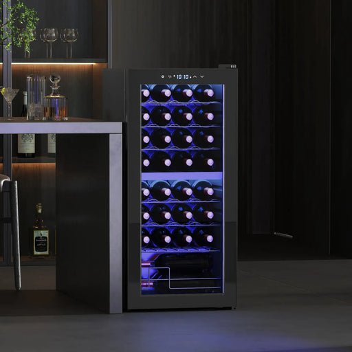 Wine cooler with illuminated interior displaying bottles in a dark room setting.