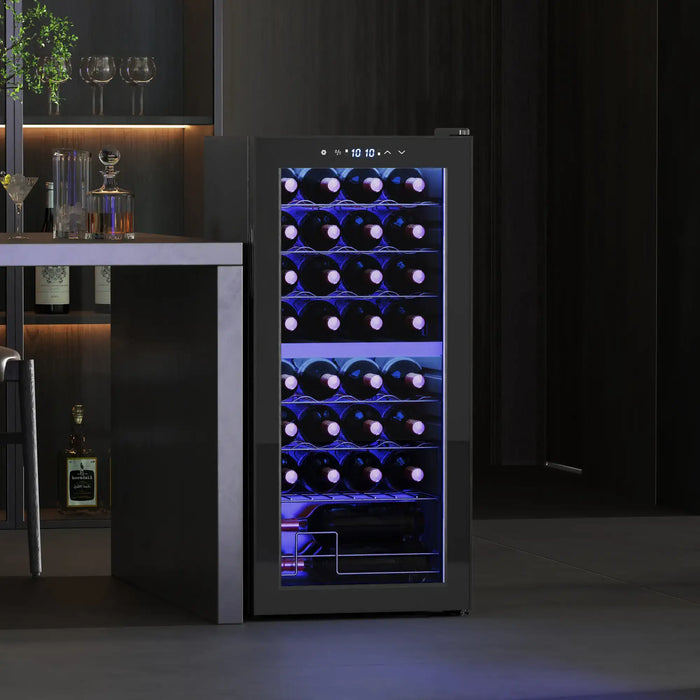 Wine cooler with illuminated interior displaying bottles in a dark room setting.