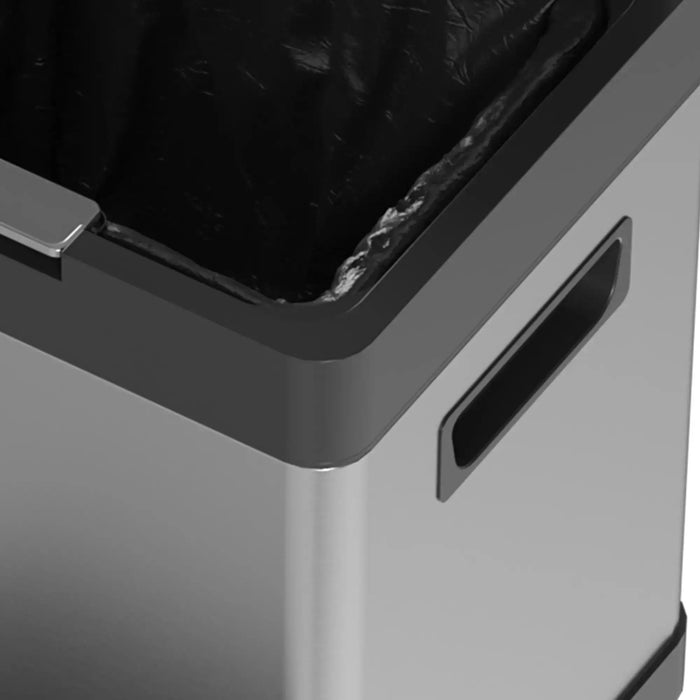 Close-up of a trash bin with a black liner.