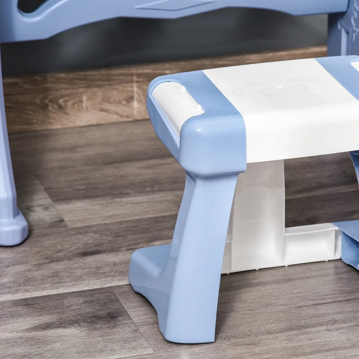 Blue and white plastic kids piano bench on wood floor, close-up view.
