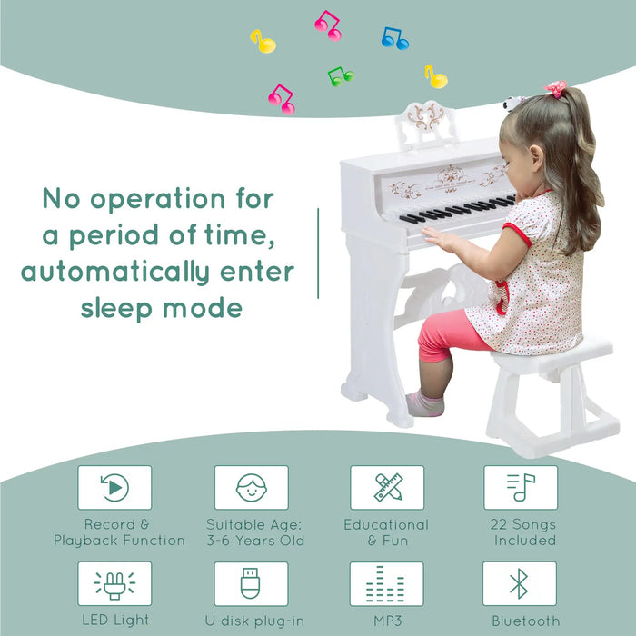 Child playing white 37-key kids piano with bench, Bluetooth, MP3, and educational features